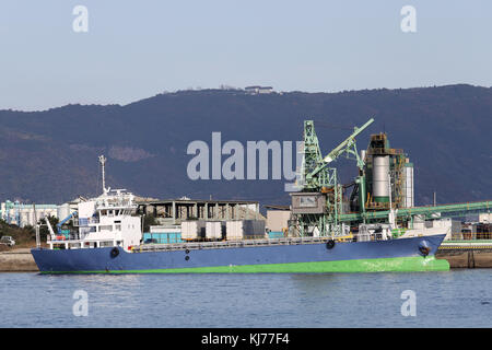 Cargo ship docked in the port Stock Photo
