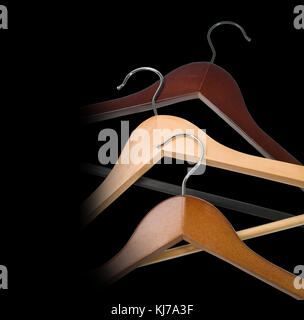 Hangers isolated on the black background with copy space Stock Photo