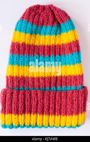 colourful striped knitted hat isolated on white background Stock Photo