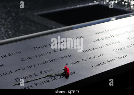 NEW YORK CITY - NOV 27: NYC's 9/11 Memorial at World Trade Center Ground Zero seen on Nov. 11, 2011. The memorial was dedicated on the 10th anniversar Stock Photo