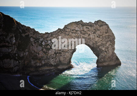 The famous natural arch of Durdle Door, on the Jurassic Coast, Dorset, UK - John Gollop Stock Photo