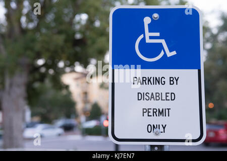 Parking By Disabled Permit Only Sign Outside Stock Photo