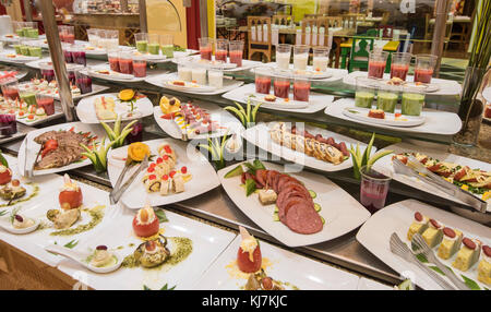 Selection display of a la carte cold meat salad food at a luxury restaurant buffet bar area Stock Photo