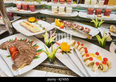 Selection display of a la carte cold meat salad food at a luxury restaurant buffet bar area Stock Photo