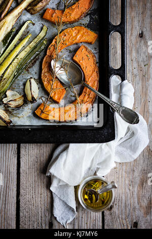 Roasted fresh vegetables on baking sheet Stock Photo