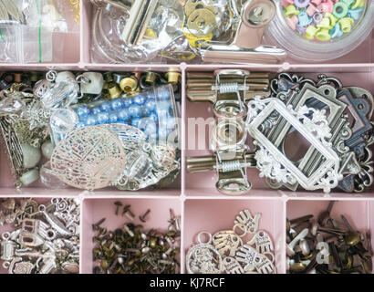 Organiser box for small accessories for handmaking, craft, scrapbooking, art and design Stock Photo