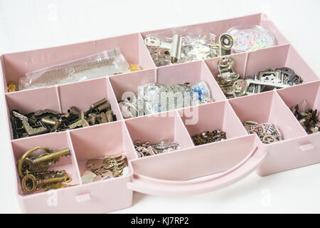 Closed tackle box full of fishing gear, close up Stock Photo - Alamy