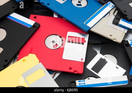 mixed pile of obselete computer floppy disks. Stock Photo