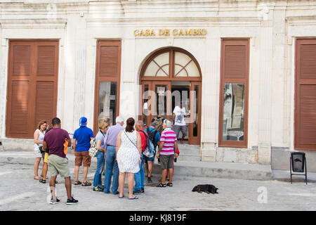 Line at the Casa de Cambio, money changer in Havana, Cuba Stock Photo