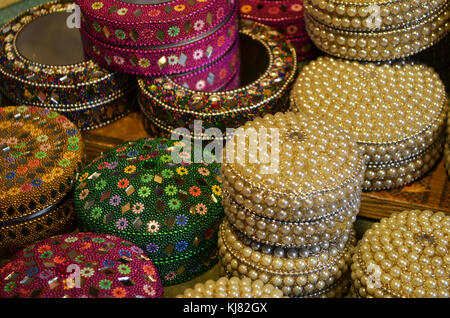 Beautiful beaded containers for sale at shop in Delhi India Stock Photo