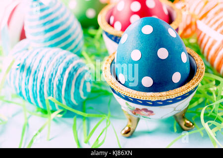 Selective focus on the front dotted blue egg Stock Photo