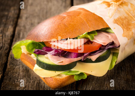 Single sandwich stuffed with cheese and ham Stock Photo