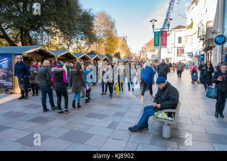 Cardiff, Wales, United Kingdom - November 19, 2017: People are shopping and visiting the Christmas Market in Cardiff on a sunny day in November 2017. Stock Photo