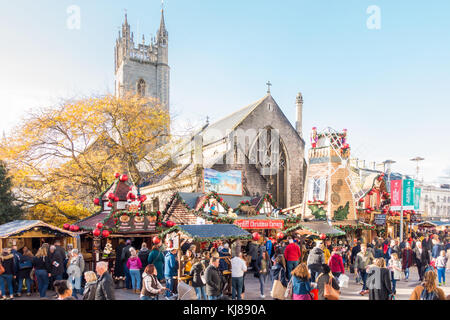 Cardiff, Wales, United Kingdom - November 19, 2017: People are eating at the food stalls while visiting the Christmas Market in Cardiff, UK in Novembe Stock Photo