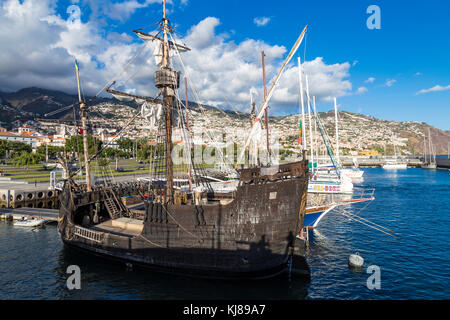 Replica of the Santa Maria sailing ship in the port at Funchal, Madeira, Portugal Stock Photo