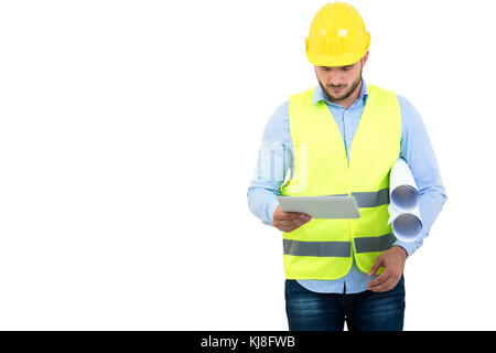 Handsome engineer working with a tablet pc, isolated on white Stock Photo