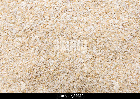 Avena Sativa is scientific name of Oat bran. Also known as Aveia or Avena. Closeup of grains, background use. Stock Photo