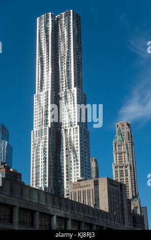8 Spruce Street, a modern structure designed by Frank Gehry, also known as Beekman Tower and New York by Gehry Stock Photo