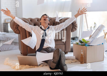 Emotional young man feeling good while being at home Stock Photo