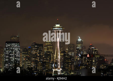 Evening dusk city scape of Seattle skyline Space Needle at night with lights Stock Photo