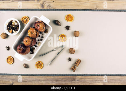 Baked apples stuffed with dried fruit nuts.  Stock Photo