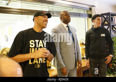 El Segundo, California, USA. 23rd June, 2017. LaVar Ball, Magic Johnson, and Lonzo Ball together at the Lakers' Practice Facility on Friday, June 23, 2017 in El Segundo, California. The Lakers selected Lonzo Ball as the No. 2 overall NBA draft pick. © 2017 Patrick T. Fallon Credit: Patrick Fallon/ZUMA Wire/Alamy Live News Stock Photo