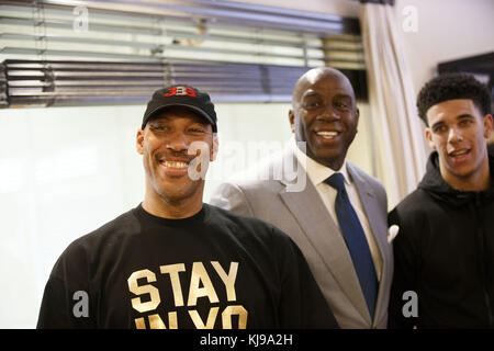 El Segundo, California, USA. 23rd June, 2017. LaVar Ball, Magic Johnson, and Lonzo Ball together at the Lakers' Practice Facility on Friday, June 23, 2017 in El Segundo, California. The Lakers selected Lonzo Ball as the No. 2 overall NBA draft pick. © 2017 Patrick T. Fallon Credit: Patrick Fallon/ZUMA Wire/Alamy Live News Stock Photo