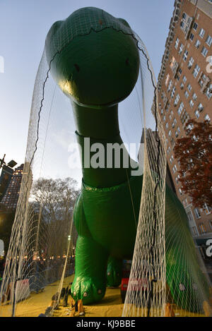 New York, USA. 22nd Nov, 2017. Sinclair's Dino balloon is inflated to prepare for the 91st Annual Macy's Thanksgiving Day Parade on November 22, 2017 in New York City. Credit: Erik Pendzich/Alamy Live News