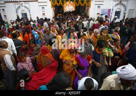 Janakpur, Nepal. 23rd Nov, 2017. Devotees enter the temple to offer prayers during the marriage anniversary of Lord Ram and Sita during Bibaha Panchami at Janaki Temple in Janakpur, some 400km southeast from Kathmandu in Nepal. The temple is filled with thousands of people from all across Nepal and India. The temple is decorated as a real marriage. Credit: Skanda Gautam/ZUMA Wire/Alamy Live News Stock Photo