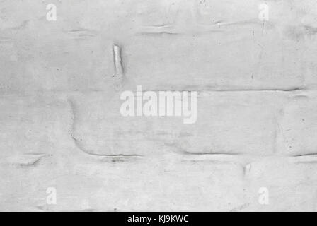 background, texture: roughly plastered and whitewashed brick wall closeup Stock Photo