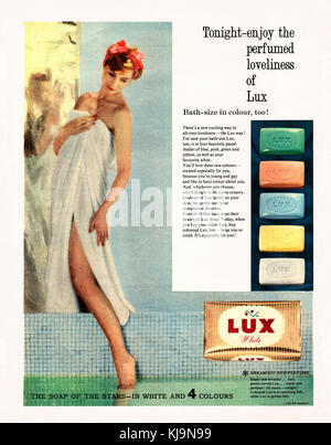 An advert for Lux soap bars. It appeared in a magazine published in the UK in 1959 and features a woman wrapped in a bathtowel and one foot in her bath