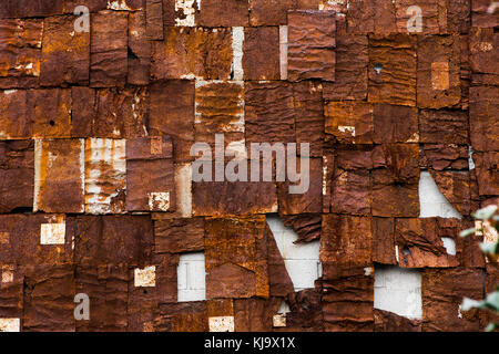 Rust background with several pieces of tin Stock Photo