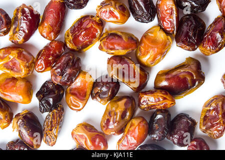 Fresh arabian dates isolated on white background Stock Photo