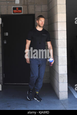 LOS ANGELES, CA - JUNE 23: Calvin Harris hits the gym after his split from Taylor Swift. Adam Richard Wiles, known professionally as Calvin Harris, is a Scottish DJ, record producer, singer, songwriter and remixer on June 23, 2016 in Los Angeles, California.  People:  Calvin Harris Stock Photo