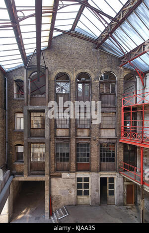 Full-height atrium with skylight and original features. The Farmiloe Building, London, United Kingdom. Architect: Lewis Henry Isaacs , 1886. Stock Photo