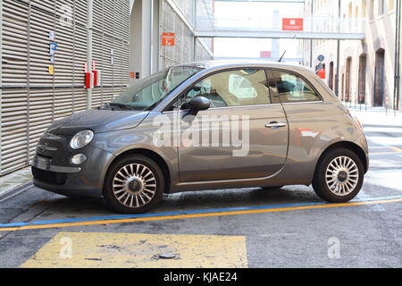 A Fiat 500 in grey in the port of Genova. Stock Photo