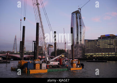 CMP Drilling platforms on the River Thames Stock Photo