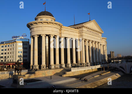 Monument to Karpoš and Museum of Archaeology at twilight in Skopje, Macedonia built as part of the Skopje 2014 project Stock Photo