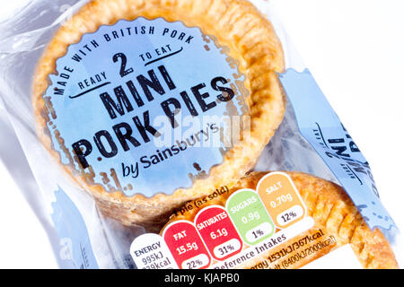 Close up of a pack of Sainsbury's 2 mini pork pies with the traffic light rating system nutritional information label, United Kingdom Stock Photo