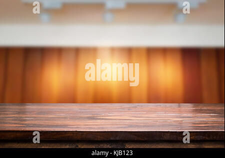 Empty wood table and blurred booked cafe light background. product ...