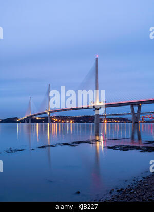Night view of new Queensferry Crossing Bridge spanning the River Forth in Scotland, United Kingdom Stock Photo
