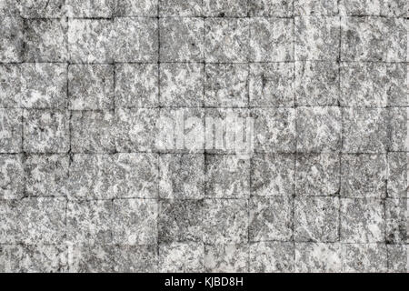 pattern  of modern style design decorative uneven cracked real stone wall surface with cement Stock Photo