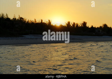 Panoramic View of Vilanculos Beach in Mozambique during high tide at sunset. Stock Photo