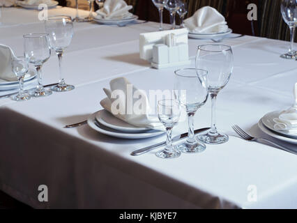 Elegantly decorated table in the restaurant for a few persons Stock Photo