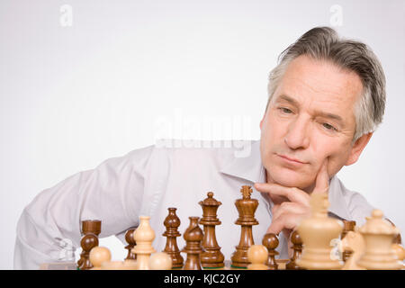 Man Playing Chess Stock Photo