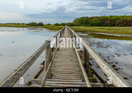 Wooden footbridge over Aberlady Bay in East Lothian in Scotland, United Kingdom Stock Photo