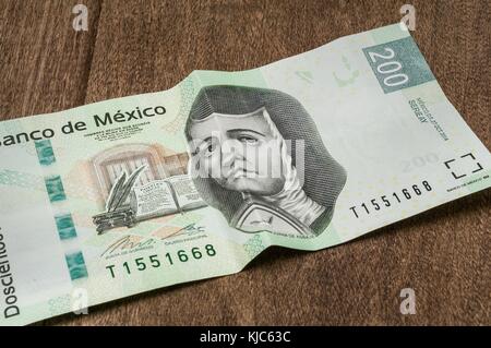 A 200 mexican pesos bill seems to be sad. Stock Photo