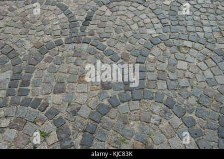 worn cobblestone pavement walkway pattern Stock Photo