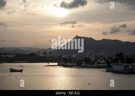 The sunsets over the Lake Pichola in Udaipur, India. Stock Photo