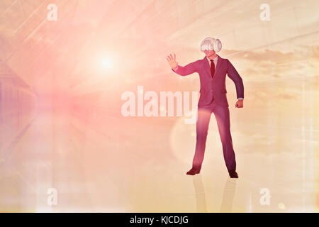 Businessman wearing virtual reality goggles Stock Photo